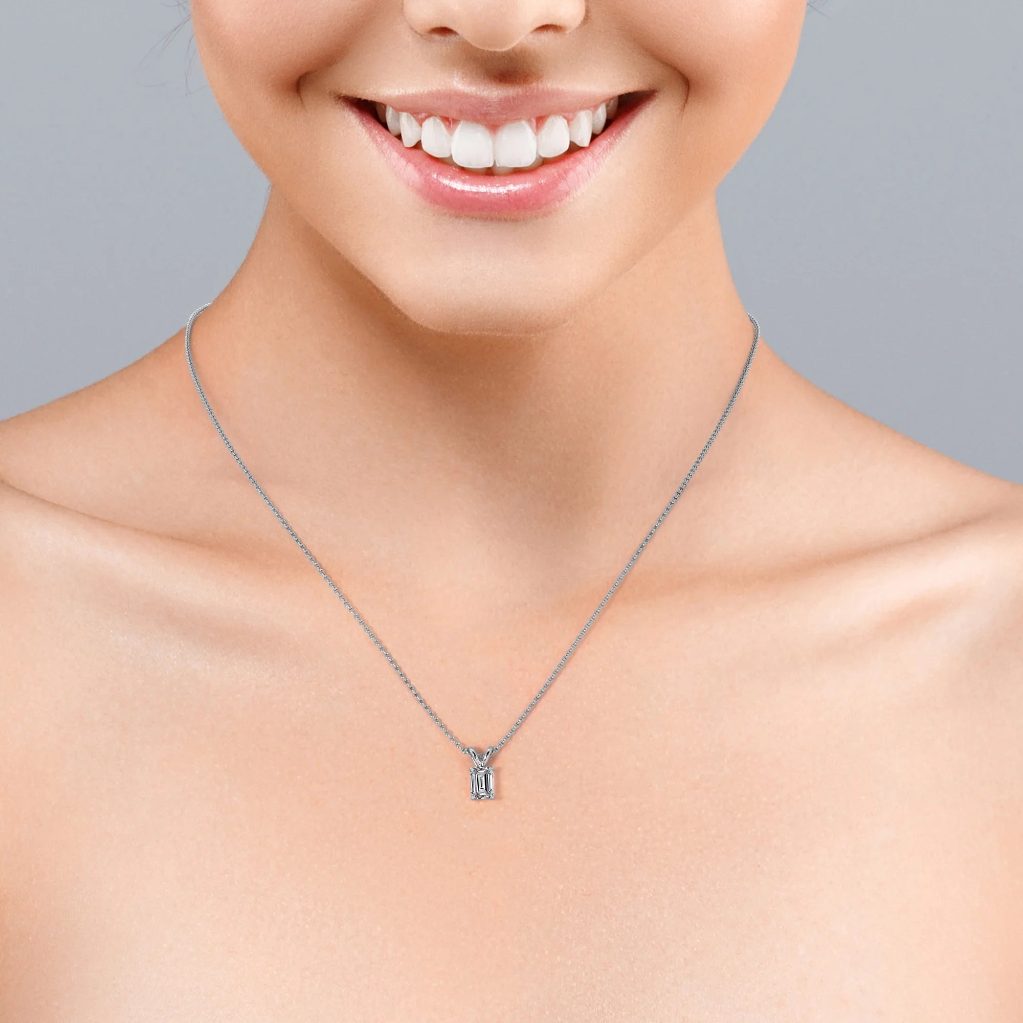1 Carat Emerald Cut Moissanite Pendant Necklace In 18K White Gold Plating Over Silver N821